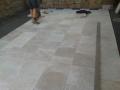 Dudley Outdoor Room With Sandstone Walls, Travertine Paving And Steps