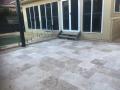 National Park Street Hamilton South. New Patio Area : Demolition and removal of concrete, new sub soil drainage system, preliminary and finished levels, travertine pavers and decorative pebbles
