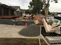Dalrymple Street Belmont North. Preliminary Excavations / Footings / Heron Charcoal Blocks & Caps / Drainage / Sir Walter Lawns / A Variety Of Shrubs / Decorative Pebbles & Fine Pine Bark